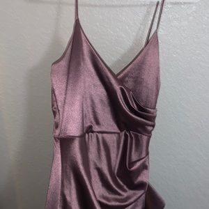 High slit nice lil ruffle and a good right around waist